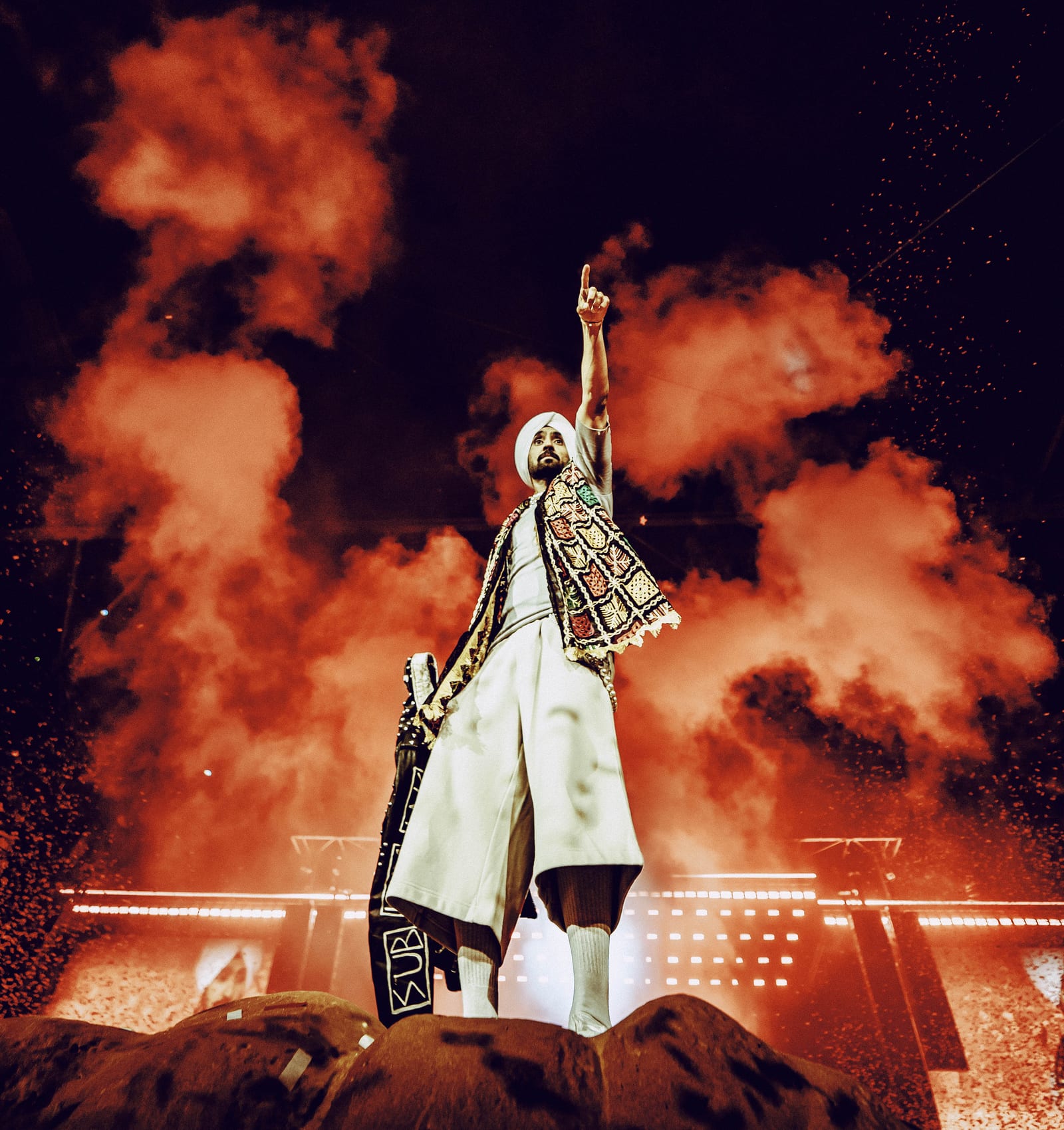 Diljit Dosanjh performing on the Aura World Tour